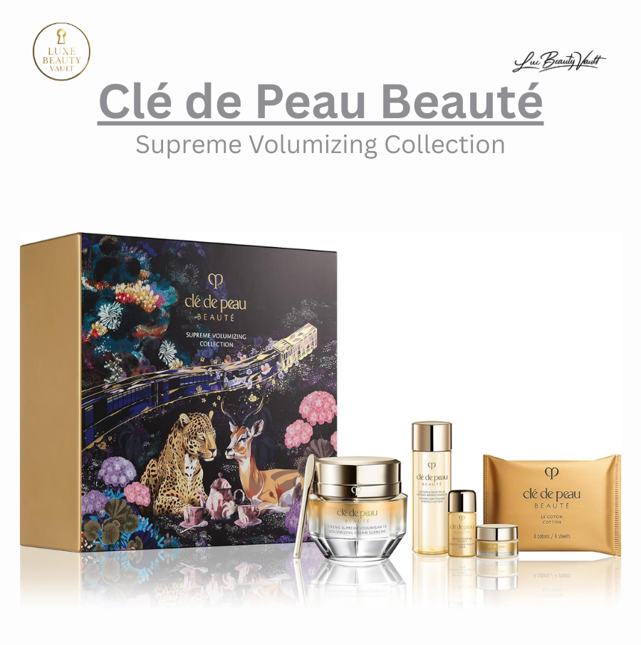 Clé de Peau Beauté Supreme Volumizing Collection holiday gift set featuring an illustrated luxury box and full skincare lineup, including Volumizing Cream Supreme, Precious Gold Vitality Serum, Hydro-Softening Essence Lotion, Eye Contour Cream Supreme, and cotton pads, a premium anti-aging collection designed to plump, firm, hydrate, and enhance skin radiance while improving the appearance of wrinkles and sagging for a smooth, youthful, filler-effect complexion.