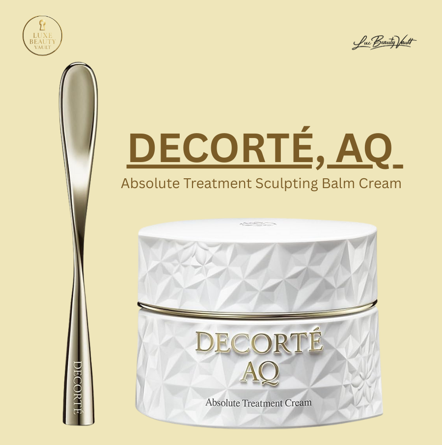 Decorté AQ Absolute Treatment Sculpting Balm Cream in elegant white faceted jar with gold detailing, shown with a sculpting massage tool, a luxury Japanese night balm cream that melts into the skin to sculpt and firm, enhance radiance, and deeply hydrate, formulated with botanical extracts, Shirakaba White Birch water, peptides, and rich emollients to strengthen, repair, and restore skin for a smooth, lifted, and rejuvenated appearance.