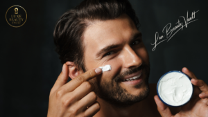 Man applying luxury skincare cream to his face – premium men’s beauty care by Lux Beauty Vault.