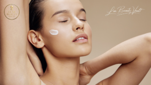 Woman applying luxury anti-ageing cream to her face with eyes closed, enjoying a premium skincare routine for deep hydration and youthful skin.