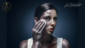 Woman with irritated, damaged skin gently wiping her face, illustrating the harmful effects of cheap skincare products and the importance of safe luxury skincare for skin barrier protection.